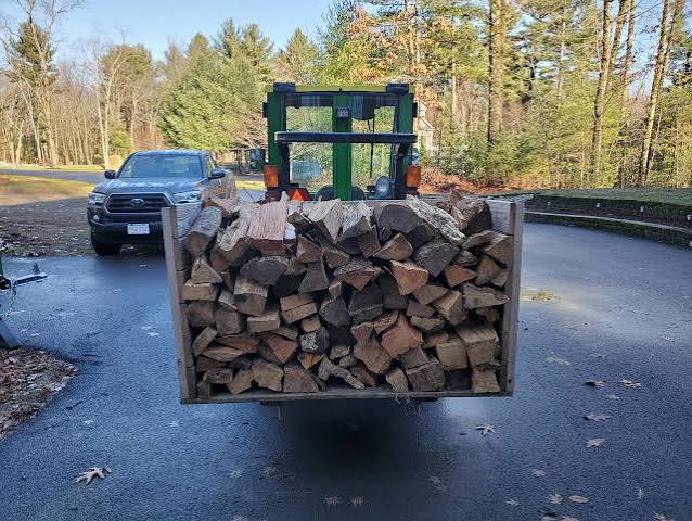 Seasoned hardwood firewood ready for a Michigan winter by Diversified Tree Service Grand Rapids MI